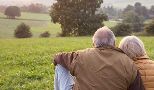 Couple sitting in nature