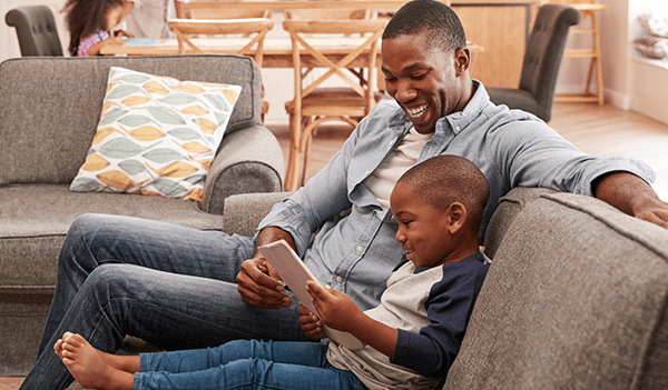 Son and dad on sofa