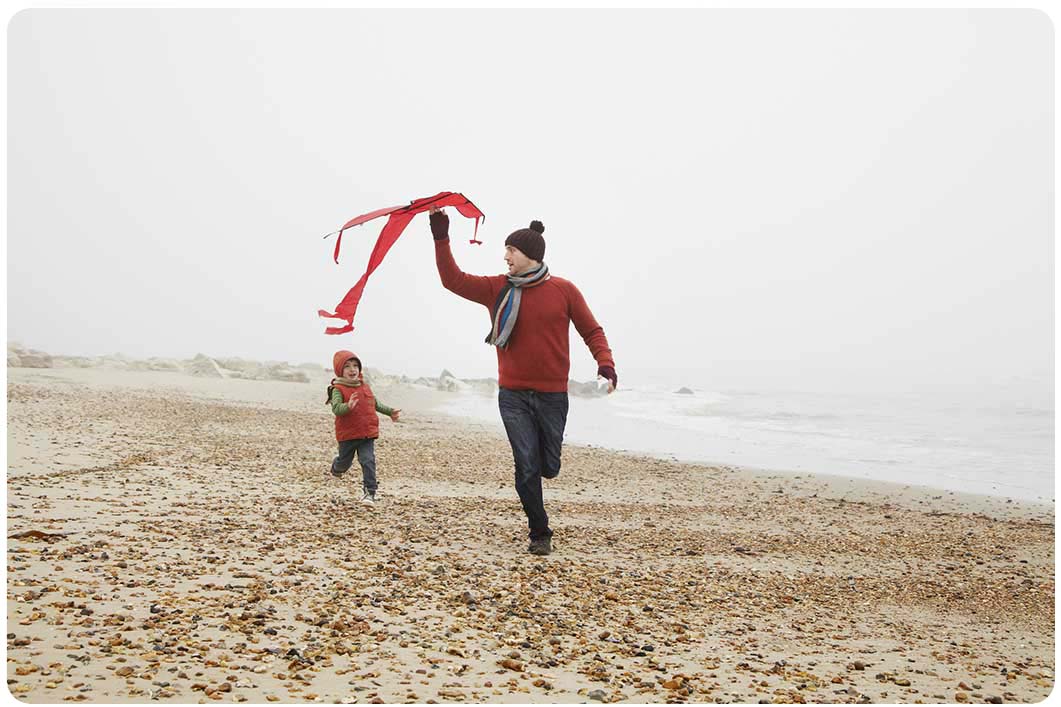 People with kite on a beach