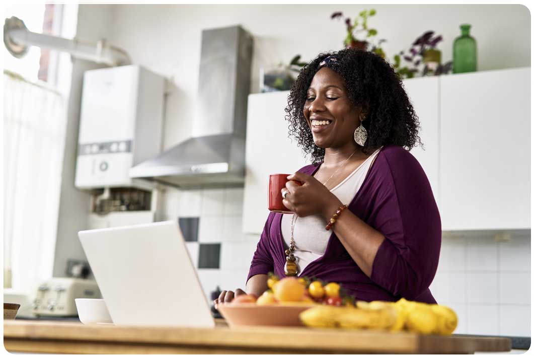 Smiling woman in kitchen