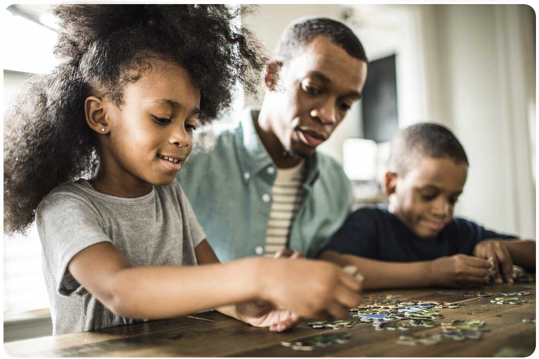 Family doing puzzle